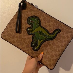 Coach rexy pouch never used